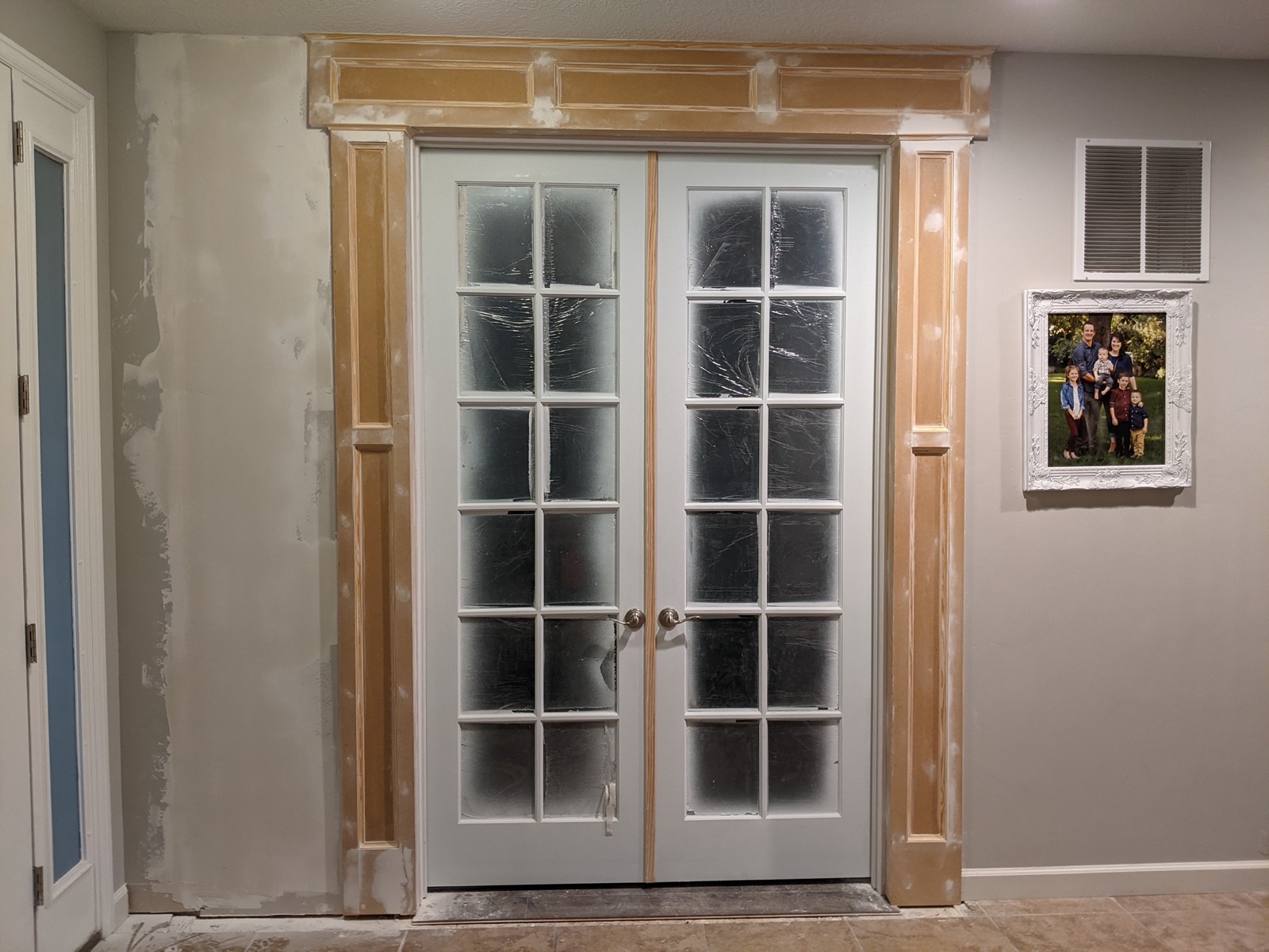 Columns and header at the French door, prepped for paint