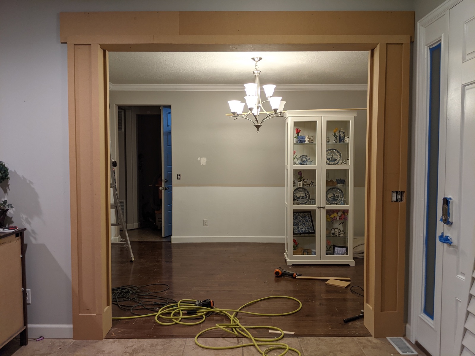 Columns and header being installed in the music room