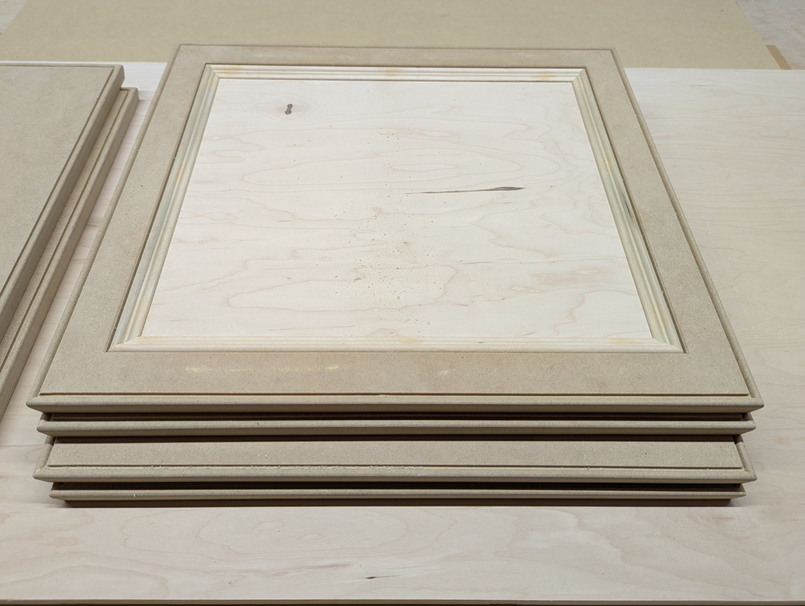 MDF and plywood cabinet doors built to match the existing kitchen cabinets