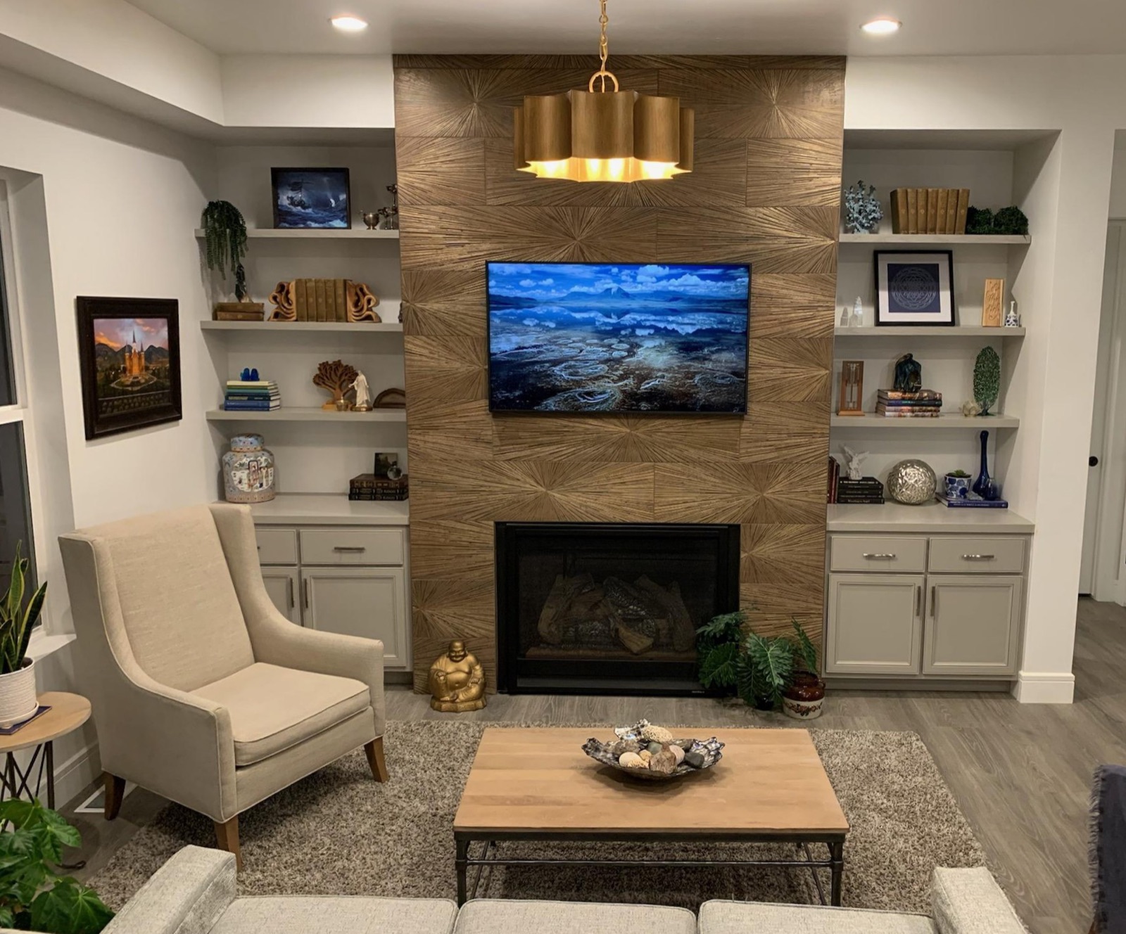 Finished built-in cabinets and shelves flanking a fireplace