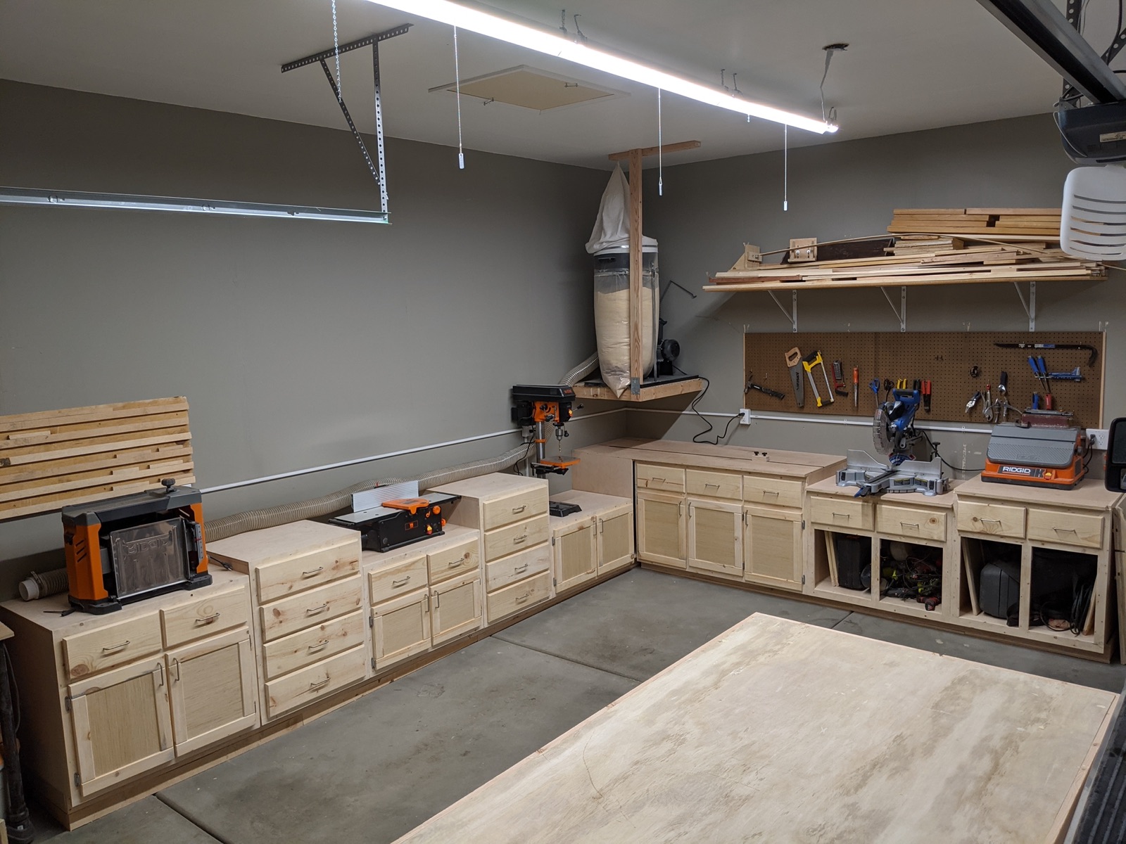 Finished garage cabinets with plywood bodies and pine face frames, left unfinished