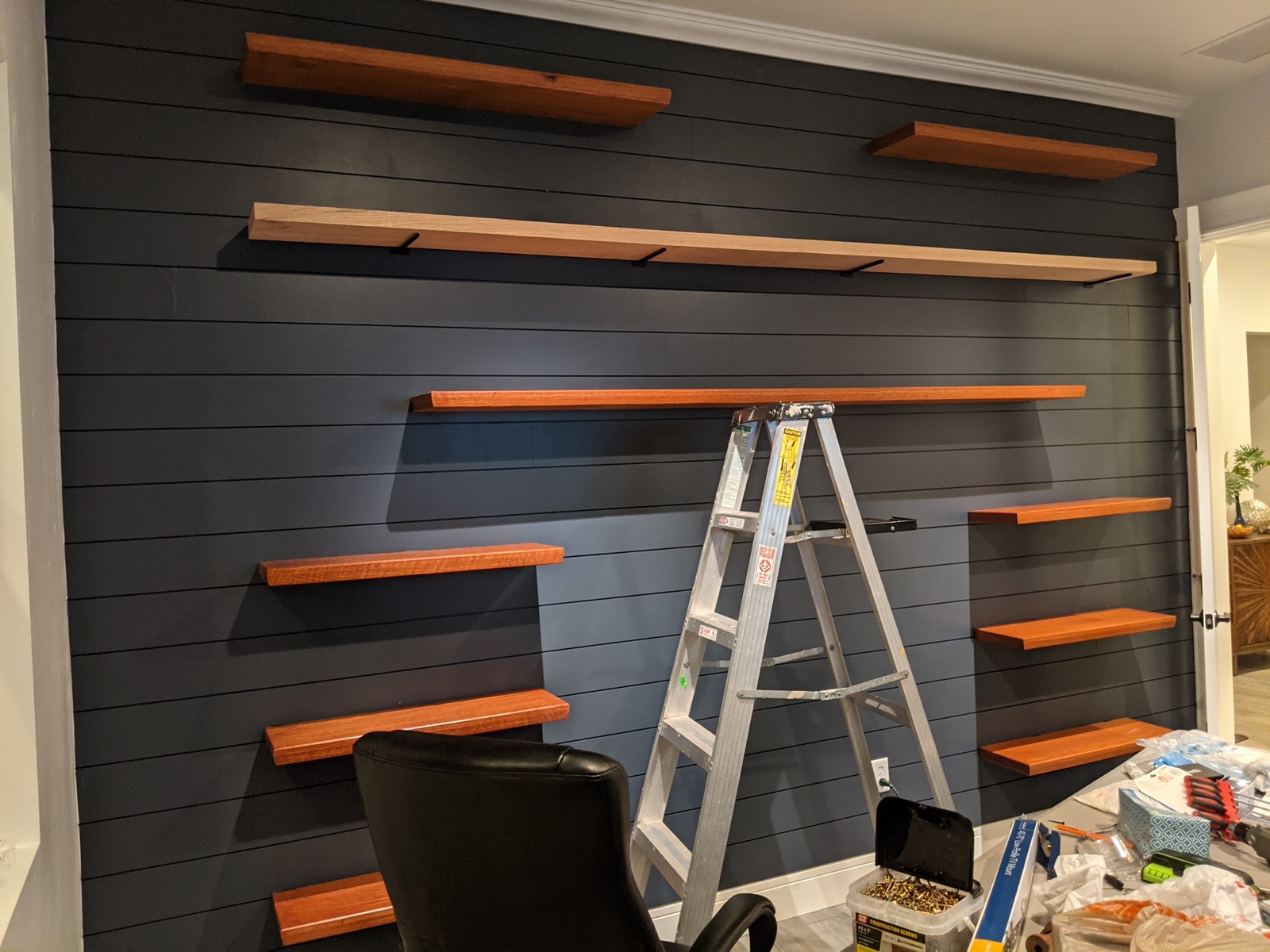 Shelves wall being installed