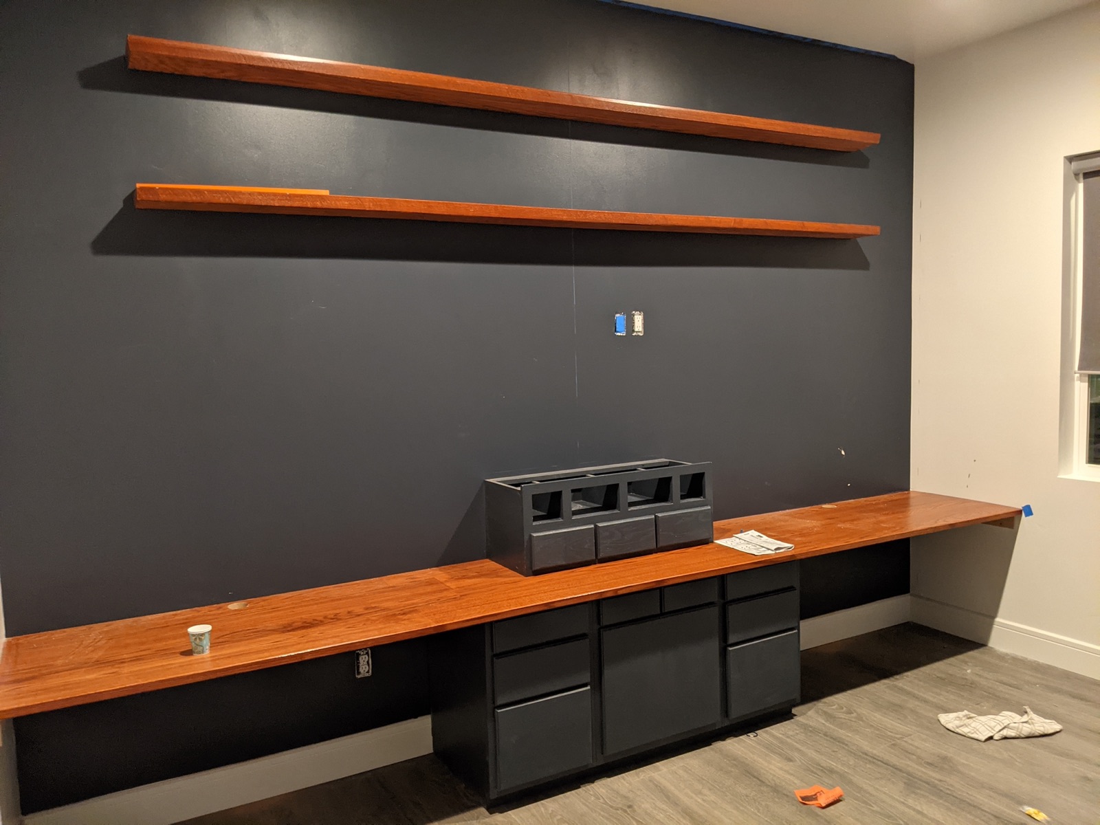 Finished desktop, shelves, and cabinet, installed